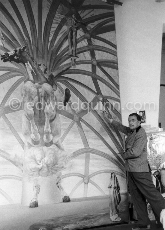 Salvador Dalí’s oil painting Santiago El Grande, featuring a rearing white horse with St. James of Compostela, the patron saint of Spain, on its back. Now at the Beaverbrook Art Gallery, Fredericton, Canada. Port Lligat, Cadaques 1957. - Photo by Edward Quinn