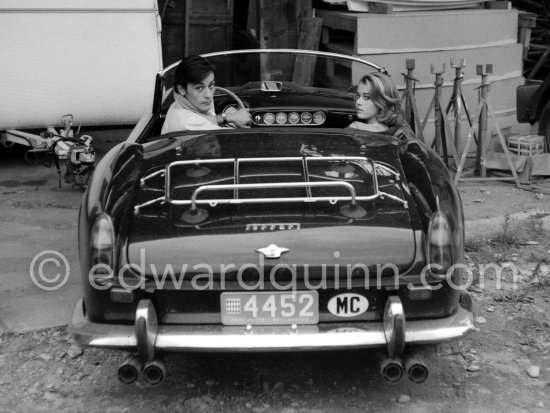 Alain Delon and Jane Fonda arriving at the film set of "Les Félins" ("Love Cage"). Ferrari 250 GT Spider California 1961. Antibes 1964. This car of Alain Delon was hammered 2015 for a record-breaking $18.5 million at an auction at Artcurial in Paris. The 250 GT Spyder California, Chassis No 2935, had been bought new by the actor Gérard Blain, then sold to fellow actor Alain Delon, who was photographed several times at the wheel of this machine, including in 1964. One of 37 examples, this Pininfarina-designed cabriolet, its whereabouts unknown to marque historians until now, is bound to attract the attention of collectors of important historic Ferrari. - Photo by Edward Quinn