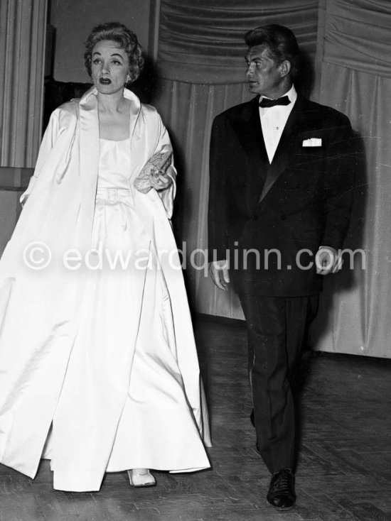 Marlene Dietrich is going to perform on the stage for the Polio Gala night at the Sporting d’Eté. On the right Jean Marais. Monte Carlo 1954. - Photo by Edward Quinn