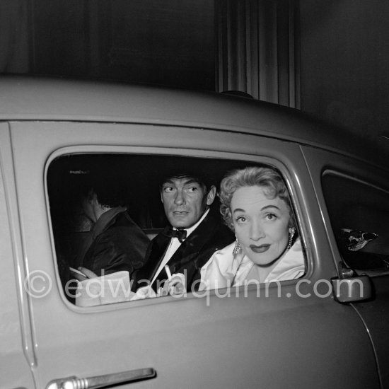 Marlene Dietrich and Jean Marais, leaving the Sporting d'Eté in Monte Carlo after a gala night in 1954. - Photo by Edward Quinn