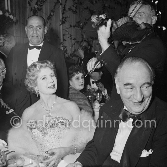 Sir Bernard Docker (Daimler car boss) and Lady Docker. "Bal de la Rose" gala dinner at the International Sporting Club in Monte Carlo, 1956. - Photo by Edward Quinn