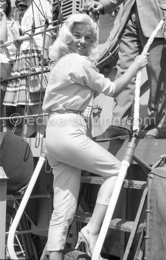 Diana Dors on U.S.S. Waller. Cannes 1957. - Photo by Edward Quinn