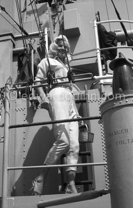 Diana Dors on U.S.S. Waller. Cannes 1957. - Photo by Edward Quinn