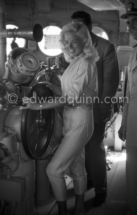 Diana Dors and Tommy Yeardye, stuntman, her boyfriend, on U.S.S. Waller. Cannes 1957. - Photo by Edward Quinn