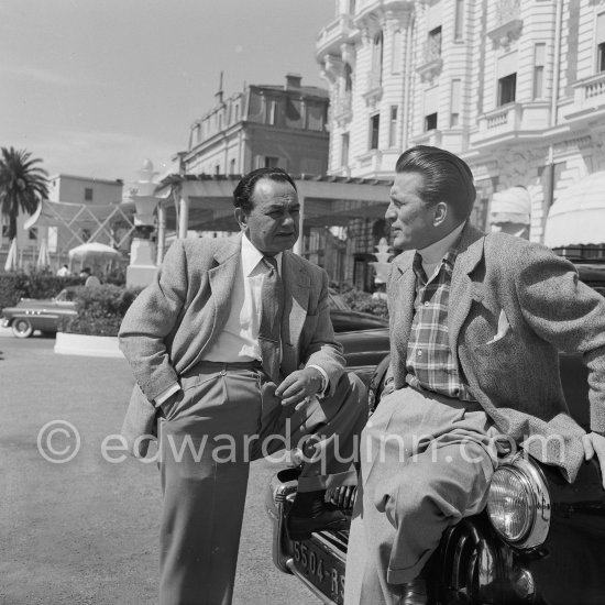 Kirk Douglas and Edward G. Robinson in front of Carlton Hotel. Cannes 1953. Car: Buick Super 1948 - Photo by Edward Quinn