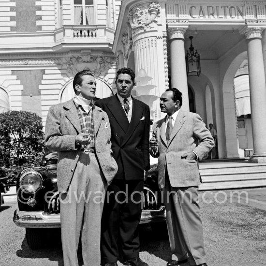 Kirk Douglas and Edward G. Robinson in front of Carlton Hotel. Cannes 1953. Car: Buick Super 1948 - Photo by Edward Quinn