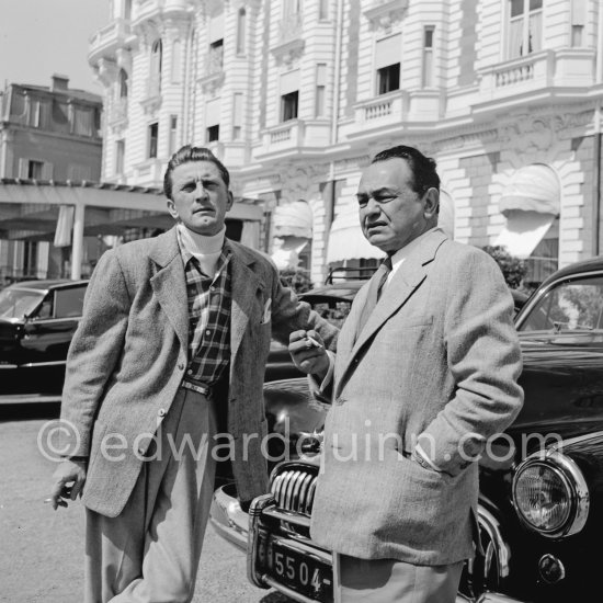 Kirk Douglas and Edward G. Robinson in front of Carlton Hotel. Cannes 1953. Car: Buick Super 1948 - Photo by Edward Quinn