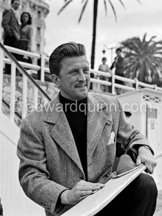 Kirk Douglas with his waterski in front of the Carlton Hotel. - Photo by Edward Quinn
