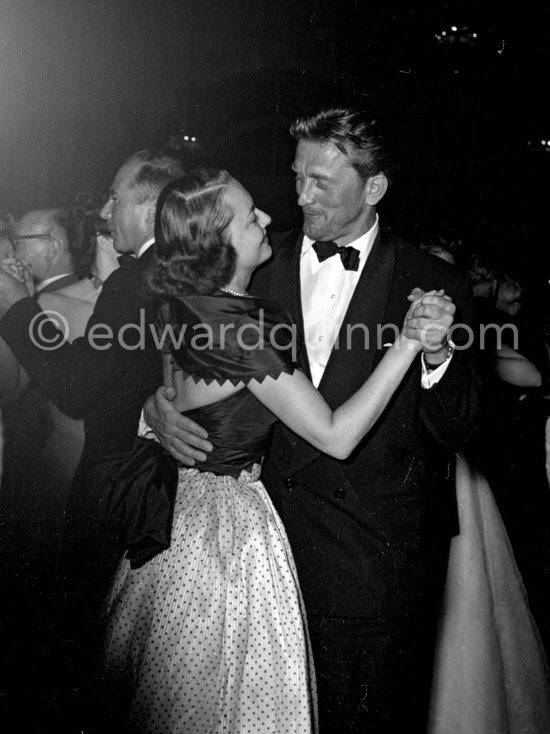 Olivia de Havilland and Kirk Douglas at a gala evening. Cannes Film Festival 1953. - Photo by Edward Quinn