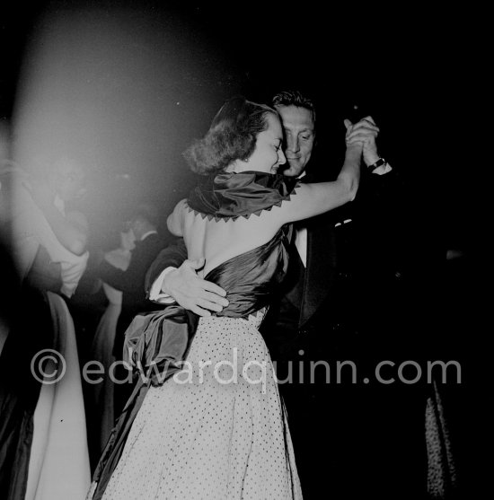 Olivia de Havilland and Kirk Douglas at a gala evening. Cannes Film Festival 1953. - Photo by Edward Quinn