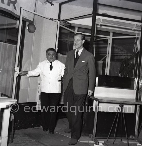 Prince Philip, Duke of Edinburgh with his aunt, the Marquioness of Milford Haven, and Mr. Felix, after a dinner at the famous restaurant "Felix". Cannes 1955. - Photo by Edward Quinn