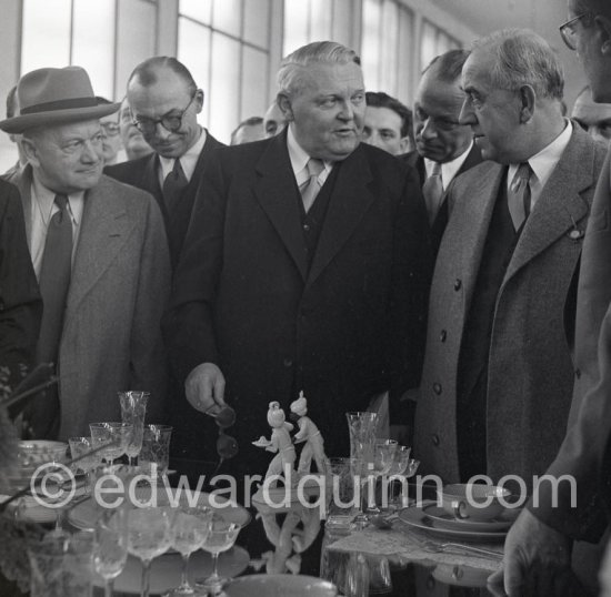 Ludwig Erhard, German Minister of Economic Affairs, Chancellor of the Federal Republic of Germany (West Germany) 1963-1966. Leading the West German postwar economic reforms and economic recovery ("Wirtschaftswunder", German for "economic miracle") and promoter of the concept of the social market economy (soziale Marktwirtschaft). At the German Industries Fair. Berlin 1952. - Photo by Edward Quinn