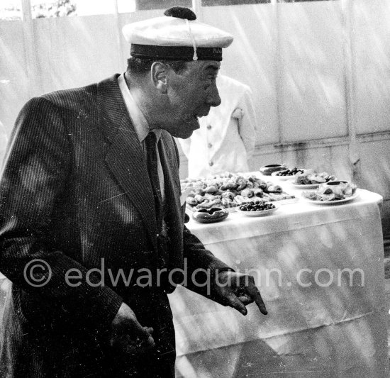 Fernandel joking around with sailors of the "Marine nationale". Cannes 1956. - Photo by Edward Quinn