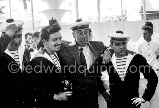 Fernandel joking around with sailors of the "Marine nationale". Cannes 1956. - Photo by Edward Quinn