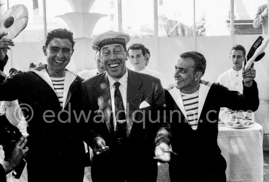 Fernandel joking around with sailors of the "Marine nationale". Cannes 1956. - Photo by Edward Quinn