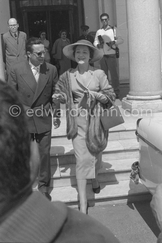 Edwige Feuillère and Cannes Film Festival organiser Robert Favre Le Bret at the Cannes Film Festival 1956. - Photo by Edward Quinn