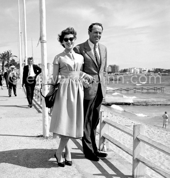 Henry Fonda and his fourth wife, Baroness Afdera Franchetti, on the Croisette in Cannes in 1957. - Photo by Edward Quinn