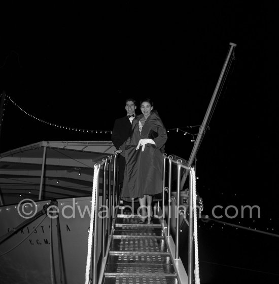 Margot Fonteyn and dancer Michael Somes, leaving Onassis' yacht Christina. Monte Carlo 1956. - Photo by Edward Quinn