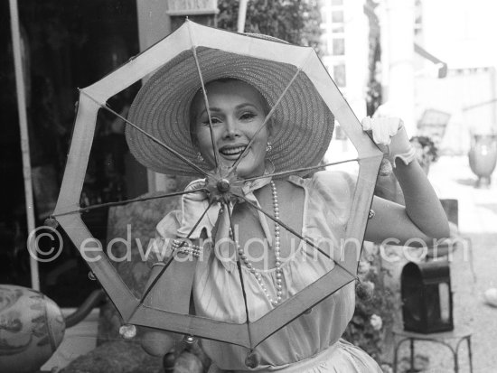 Zsa Zsa Gabor, outside an antique dealer\'s shop, Antibes 1959. - Photo by Edward Quinn