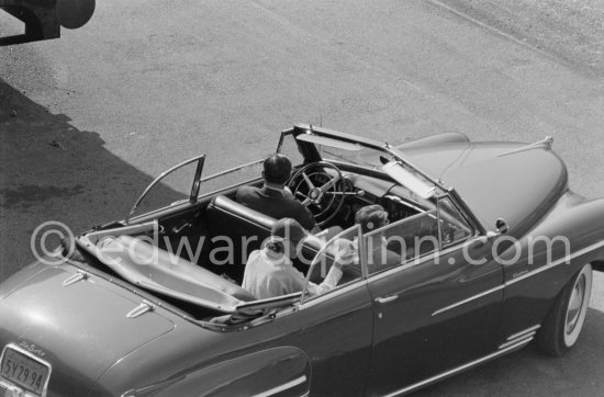 Greta Garbo, Aristotle Onassis and driving George Schlee, the wealthy American who was her friend for 20 years. Monte Carlo 1955. Car: De Soto Custom Convertible 1950. - Photo by Edward Quinn