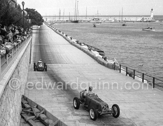 Juan Manuel Fangio, (34) Alfa Romeo 158 Alfetta, winner of the Monaco Grand Prix 1950, behind Bob Gerard, (26) ERA R4A/B. - Photo by Edward Quinn