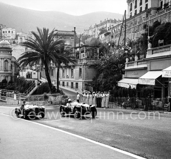 Stirling Moss, (26) Frazer Nash Le Mans Replica Mk II and Marcel Becquart, Jowett Jupiter R1 in front of the legendary Chatham Bar. Monaco Grand Prix 1952, transformed into a race for sports cars. This was a two day event, the Sunday for the up to 2 litres (Prix de Monte Carlo), the Monday for the bigger engines, (Monaco Grand Prix). - Photo by Edward Quinn