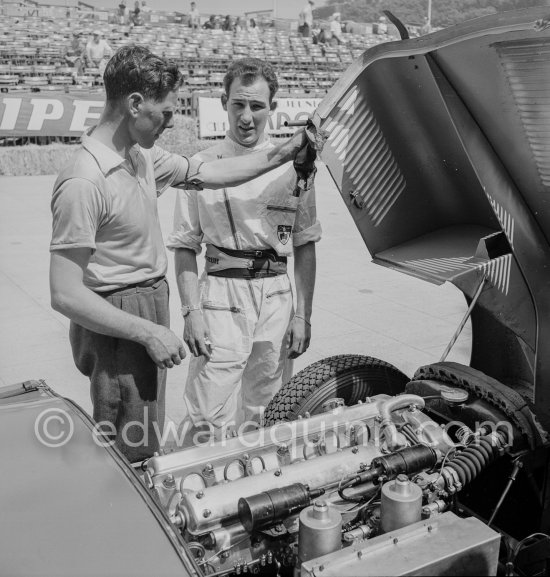 Stirling Moss and a mechanic. Jaguar C-Type (82) of Tommy Wisdom. Monaco Grand Prix 1952, transformed into a race for sports cars. This was a two day event, the Sunday for the up to 2 litres (Prix de Monte Carlo), the Monday for the bigger engines, (Monaco Grand Prix). - Photo by Edward Quinn