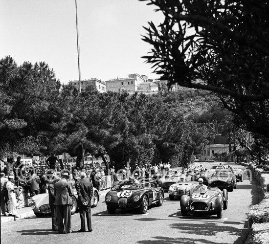 Pierre Levegh, (68) (hidden) Talbot Lago T26GS; Stirling Moss, (78) Jaguar C-Type; Luigi Stagnoli, (90) Ferrari 225S; Robert Manzon, (56) Simca Gordini T15S; Reg Parnell, (72) Aston Martin DB3; "Pagnibon", (60) Ferrari 225S; Lance Macklin, (76) Aston Martin DB3; Louis Rosier, (64) Talbot-Lago; Ferrari 225S; Eugenio Castellotti, (92) Ferrari 225 S; Giovanni Bracco, (88) Ferrari 250S; Vittorio Marzotto, (94) Ferrari 225S; Peter Collins, (74) Aston Martin DB3; Anthony Hume, (84) Allard J2. Monaco Grand Prix 1952, transformed into a race for sports cars. This was a two day event, the Sunday for the up to 2 litres (Prix de Monte Carlo), the Monday for the bigger engines, (Monaco Grand Prix). - Photo by Edward Quinn