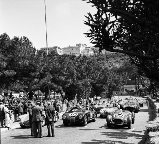 Pierre Levegh, (68) (hidden) Talbot Lago T26GS, Stirling Moss, (78) Jaguar C-Type, Luigi Stagnoli, (90) Ferrari 225S, Robert Manzon, (56) Simca Gordini T15S, Reg Parnell, (72) Aston Martin DB3, Pierre Boncampi, (60) Ferrari 225S, Lance Macklin, (76) Aston Martin DB3, Louis Rosier, (64) Talbot-Lago, Pagnibon, (60) Ferrari 225S, Eugenio Castellotti, (92) Ferrari 225 S, Giovanni Bracco, (88) Ferrari 250S, Peter Collins, (74) Aston Martin DB3, Anthony Hume, (84) Allard J2, Francesco Mascarenhas, (100) Allard J2. Monaco Grand Prix 1952, transformed into a race for sports cars. This was a two day event, the Sunday for the up to 2 litres (Prix de Monte Carlo), the Monday for the bigger engines, (Monaco Grand Prix). - Photo by Edward Quinn