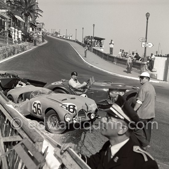 The accident at Sainte-Dévote: Hume, (84) Allard J7, Manzon, (56) Simca Gordini T15S, Reg Parnell, (72) Aston Martin DB3. The Aston engine of Parnell blows up in the Ste-Devote and aligns his car against the straw bales, Stagnoli brakes too hard and does a double spin. Moss, Jaguar C-Type XKC 003 and Manzon find an obstructed road, spin and end up against the poor Aston, then Hume spins and reverses into the pile. Fortunately nobody gets hurt. Moss restarted after the accident, but got a black flag for receiving outside help. Monaco Grand Prix 1952, transformed into a race for sports cars. This was a two day event, the Sunday, Prix Monte Carlo, for the up to 2 litres (Prix de Monte Carlo), the Grand Prix, Monday for the bigger engines, (Monaco Grand Prix). - Photo by Edward Quinn