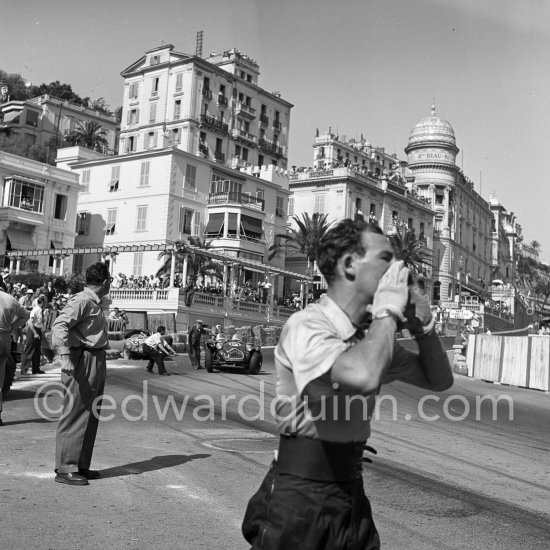 The accident at Sainte-Dévote: Stirling Moss, (78) signals danger to Commissioners. Hume, (84) Allard J7, Manzon, (56) Simca Gordini T15S in the background. Monaco Grand Prix 1952, transformed into a race for sports cars. This was a two day event, the Sunday, Prix Monte Carlo, for the up to 2 litres (Prix de Monte Carlo), the Grand Prix, Monday for the bigger engines, (Monaco Grand Prix). - Photo by Edward Quinn