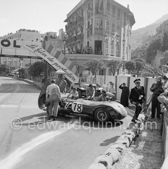 No.78 Stirling Moss at the back of his car Jaguar C-Type XKC 003 (in front). The Aston engine of Parnell blows up in the Ste-Devote and aligns his car against the straw bales, Stagnoli brakes too hard and does a double spin. Moss on Jaguar C-Type XKC 003 and Manzon find an obstructed road, spin and end up against the poor Aston, then Hume spins and reverses into the pile. Lucky no one gets hurt. Monaco Grand Prix 1952. (transformed into a race for sports cars with engines larger than 2 liters) - Photo by Edward Quinn