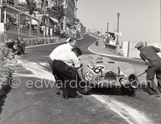 The accident at Sainte-Dévote: 56 Robert Manzon, Simca Gordini I5S. The Aston engine of Parnell blows up in the Ste-Devote and aligns his car against the straw bales, Stagnoli brakes too hard and does a double spin. Moss, Jaguar C-Type XKC 003 and Manzon find an obstructed road, spin and end up against the poor Aston, then Hume spins and reverses into the pile. Fortunately nobody gets hurt. Moss restarted after the accident, but got a black flag for receiving outside help. Monaco Grand Prix 1952, transformed into a race for sports cars. This was a two day event, the Sunday for the up to 2 litres (Prix de Monte Carlo), the Monday for the bigger engines, (Monaco Grand Prix). - Photo by Edward Quinn