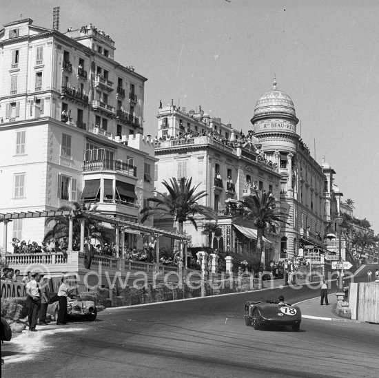 The accident at Sainte-Dévote: Stirling Moss, (78) restarts his Jaguar C-Type XKC 003 but got a black flag for receiving outside help. Monaco Grand Prix 1952, transformed into a race for sports cars. This was a two day event, the Sunday, Prix Monte Carlo, for the up to 2 litres (Prix de Monte Carlo), the Grand Prix, Monday for the bigger engines, (Monaco Grand Prix). The Aston engine of Parnell blows up in the Ste-Devote and aligns his car against the straw bales, Stagnoli brakes too hard and does a double spin. Moss, Jaguar C-Type XKC 003 and Manzon find an obstructed road, spin and end up against the poor Aston, then Hume spins and reverses into the pile. Fortunately nobody gets hurt. - Photo by Edward Quinn