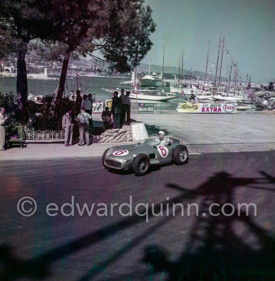 Stirling Moss, (6) Mercedes-Benz W196. With the shadow of the Gazomètre. Monaco Grand Prix 1955. - Photo by Edward Quinn
