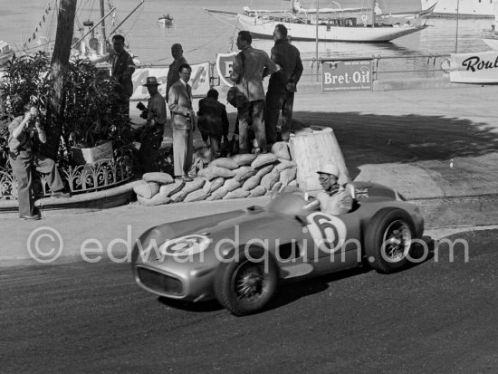 Stirling Moss, (6) Mercedes-Benz W196. With the shadow of the Gazomètre. Monaco Grand Prix 1955. - Photo by Edward Quinn