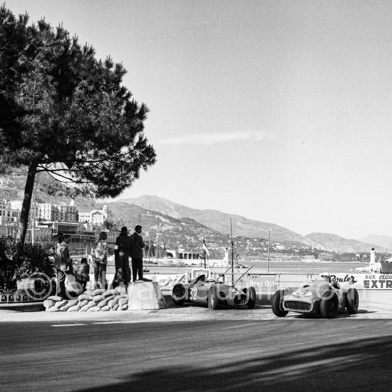Stirling Moss, (6) Mercedes-Benz W196, Chiron, (32) Lancia D50. Monaco Grand Prix 1955. - Photo by Edward Quinn