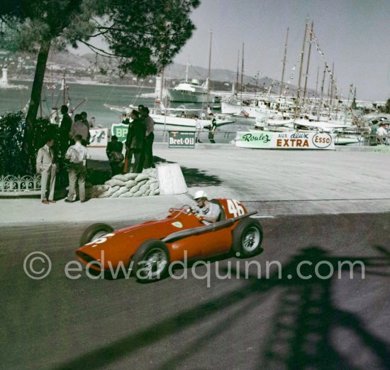 Harry Schell, (46) Ferrari 555. With the shadow of the Gazomètre. Monaco Grand Prix 1955. - Photo by Edward Quinn