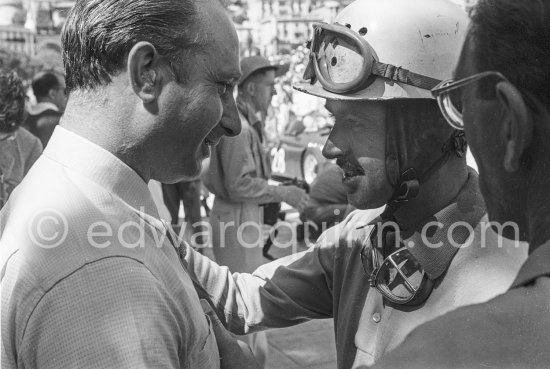 Fangio with French driver Maurice Trintignant, winner of the Monaco Grand Prix 1955. - Photo by Edward Quinn