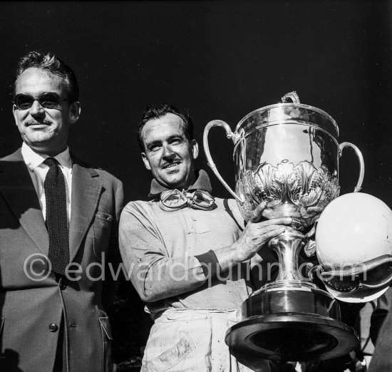 Prince Rainier presents winner Maurice Trintignant with the splendid Coupe  du Grand Prix. Monaco Grand Prix 1955.