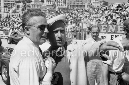 Juan Manuel Fangio and "Maestro" Nello Ugolini, sporting director until 1955 of Scuderia Ferrari, from 1956 of Maserati. - Photo by Edward Quinn