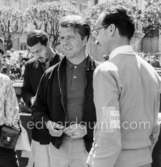 Wolfgang Graf Berghe von Trips with Ferrari racing manager Romolo Tavoni, in the background Joakim Bonnier. Monaco Grand Prix 1958. - Photo by Edward Quinn