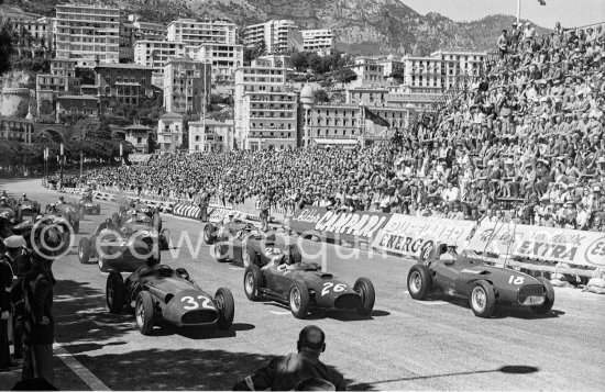 Start. Juan Manuel Fangio, (32) Maserati 250F, Peter Collins, (26) Ferrari 801, Stirling Moss, (18) Vanwall VW3/4, Tony Brooks, (20) Vanwall VW7/V1, Mike Hawthorn, (28) Ferrari-Lancia D50, Carlos Mediteguy, (36) Maserati 250F, Harry Schell, (38), Maserati 250F, Wolfgang von Trips, (24) Ferrari 80I, Masten Gregory, (2) Maserati 250F, Ron Flockhart, (6) B.R.M. P25, Horace H. Gould, (22), Maserati 250F, Jack Brabham, (14) Cooper T43, Stewart Lewis-Evans, (10) Connaught B, Giorgio Scarlatti, (34) Maserati 250F, Ivor Bueb, (12), Connaugh B. Monaco Grand Prix 1957. - Photo by Edward Quinn