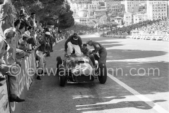 Wolfgang von Trips (left) and Mike Hawthorn change the car (24) Ferrari 80I after 92 laps. Monaco Grand Prix 1957. - Photo by Edward Quinn