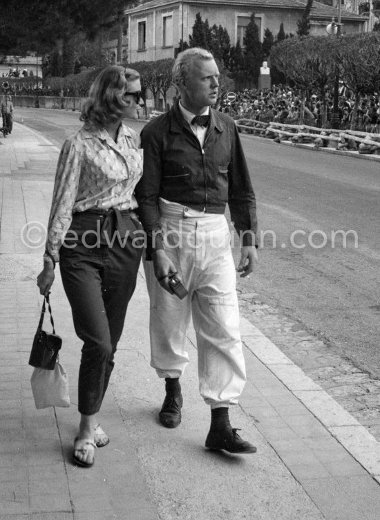 Mike Hawthorn with American friend Valerie Witalis. Hawthorn was noted for wearing a bow tie and a white shirt when racing. Monaco Grand Prix 1957. - Photo by Edward Quinn