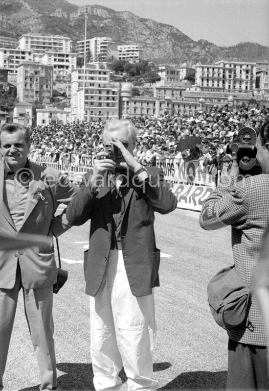 Mike Hawthorn. Hawthorn was noted for wearing a bow tie and a white shirt when racing. Monaco Grand Prix 1957. - Photo by Edward Quinn