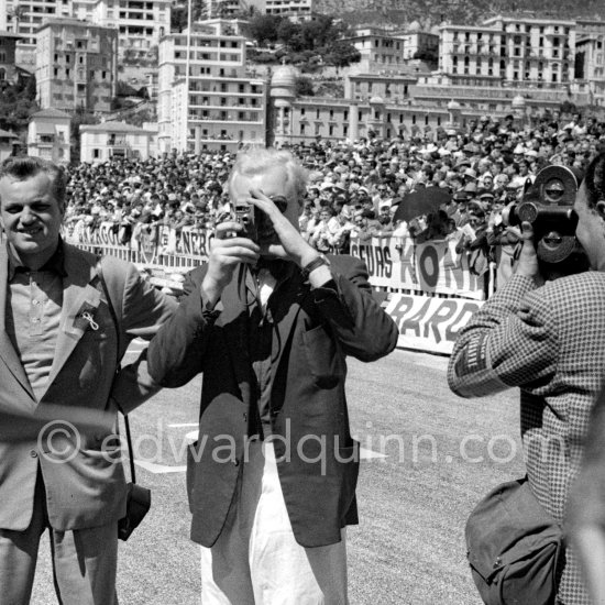 Mike Hawthorn. Hawthorn was noted for wearing a bow tie and a white shirt when racing. Monaco Grand Prix 1957. - Photo by Edward Quinn