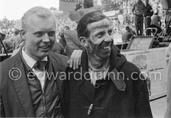 Mike Hawthorn who was noted for wearing a bow tie and a white shirt when racing and Tony Brooks. Monaco Grand Prix 1957. - Photo by Edward Quinn