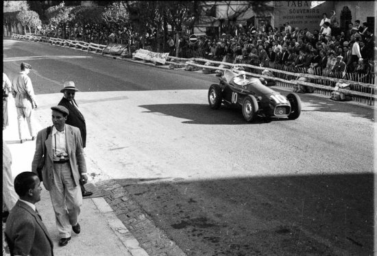Stewart Lewis-Evans, (10) Connaught B. With white hat Tony Vandervell, head of the Vanwall Formula One racing team. Grand Prix Monaco 1957. When Vandervell was asked why he ploughed his fortune into building a British Grand Prix team he said, dismissively, 'Some people play golf; I play cars.' B But for him it was a lot more serious than that: the honour of Great Britain was at stake, and he was determined to beat Ferrari and Maserati. (Moss Racing Life p.18)1.) Tony Vandervell could be a difficult man, but as long as his cars were winning he was happy. (Moss Racing Life p.18)3 - Photo by Edward Quinn
