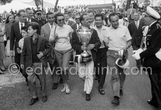 Maurice Trintignant the race\'s winner, (20) Cooper T45, and his wife Loulou. Monaco Grand Prix 1958. - Photo by Edward Quinn